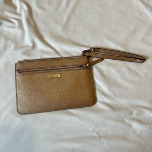 Rose gold gently used Kate Spade wristlet
